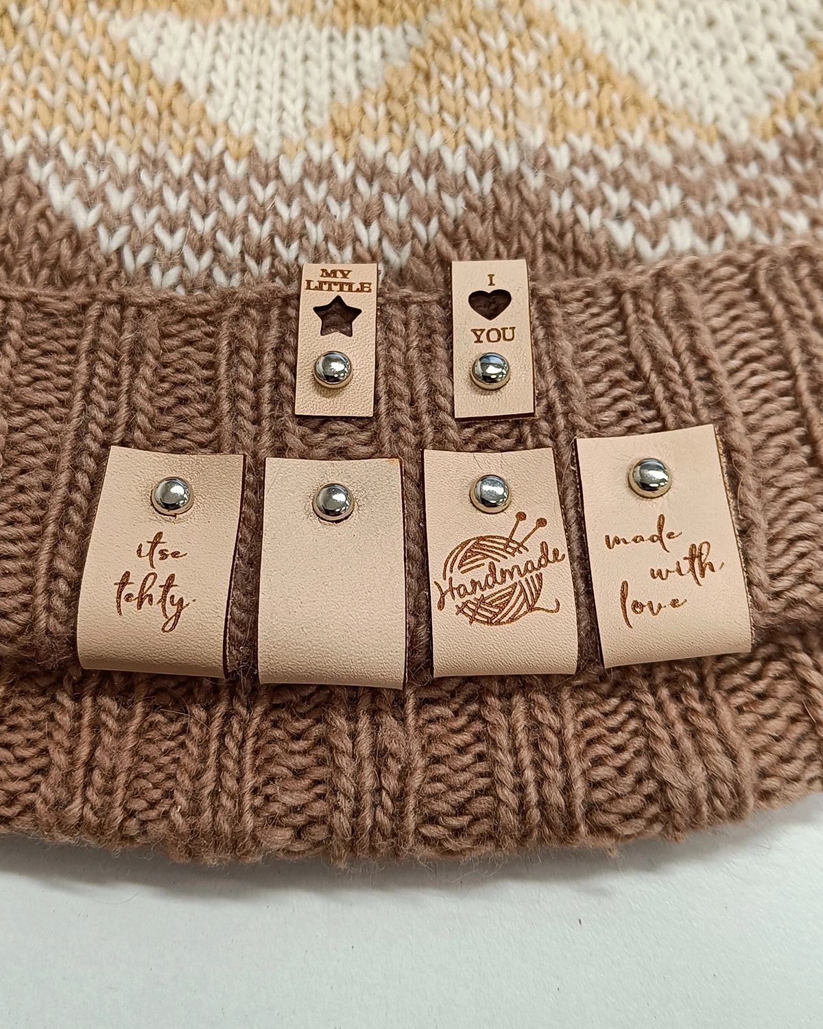 Leather tag with metal rivet